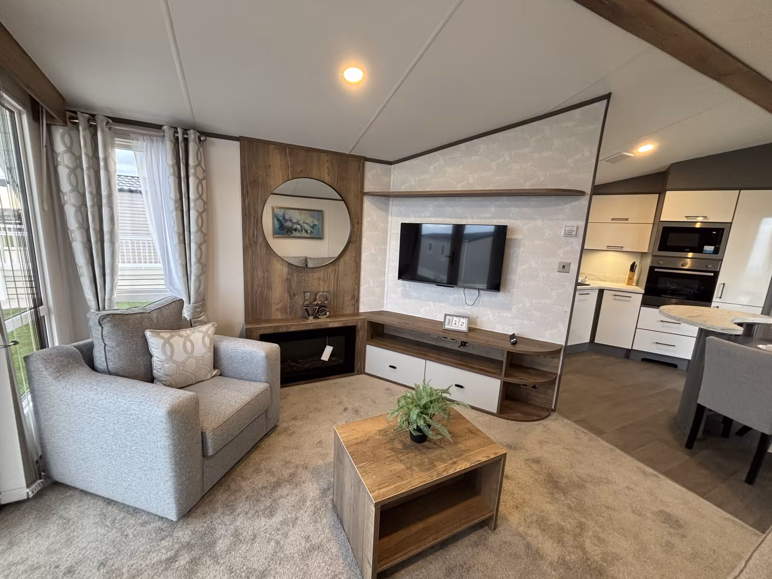 Living room area in the 2023 Atlas Status on sale at Elm Bank Coastal Park in Berwick-upon-Tweed, Northumberland.