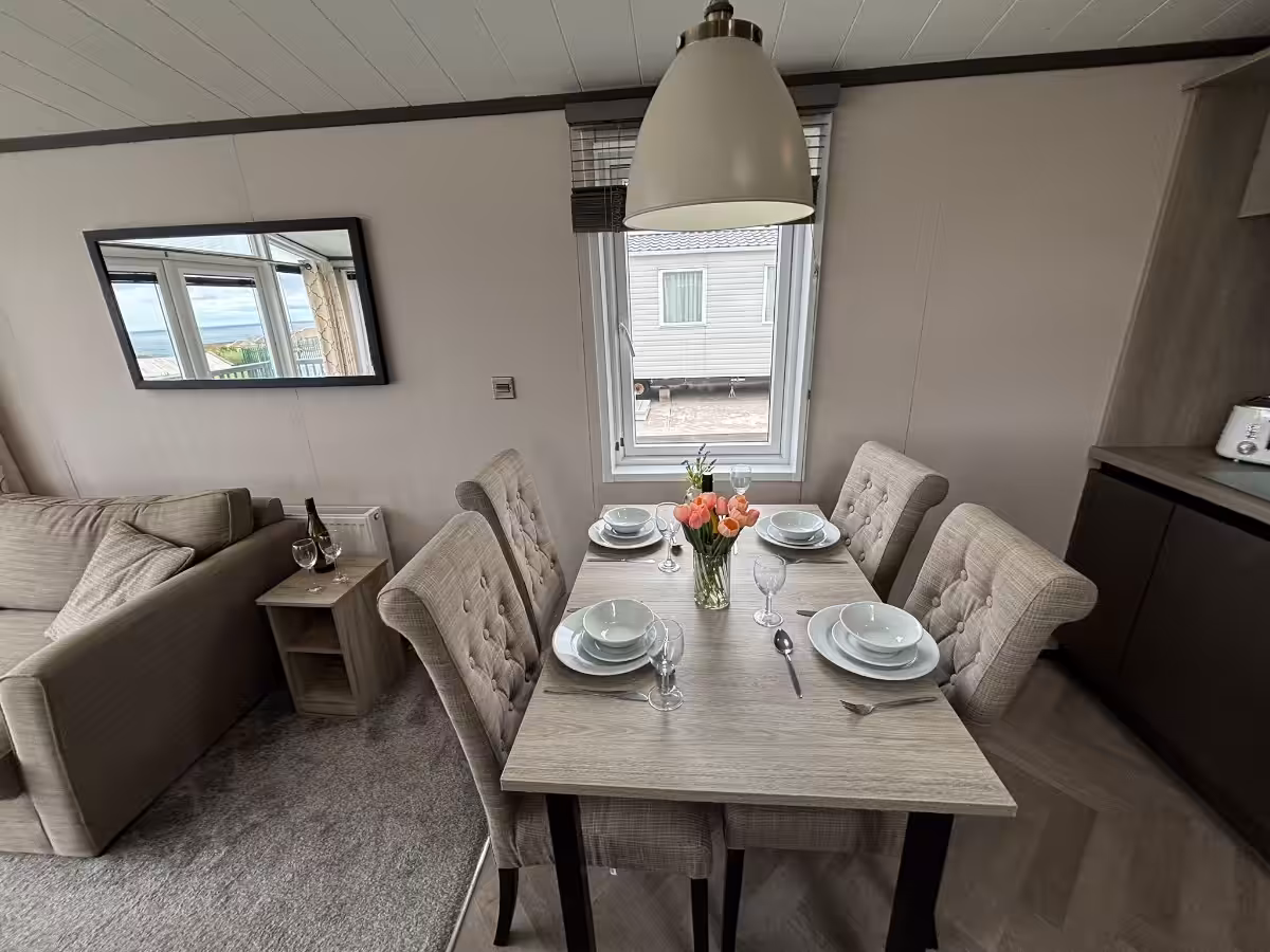 Dining room in the 2021 Victory Lakewood Lodge for sale at Elm Bank Coastal Park in Spittal, Berwick-upon-Tweed, Northumberland.