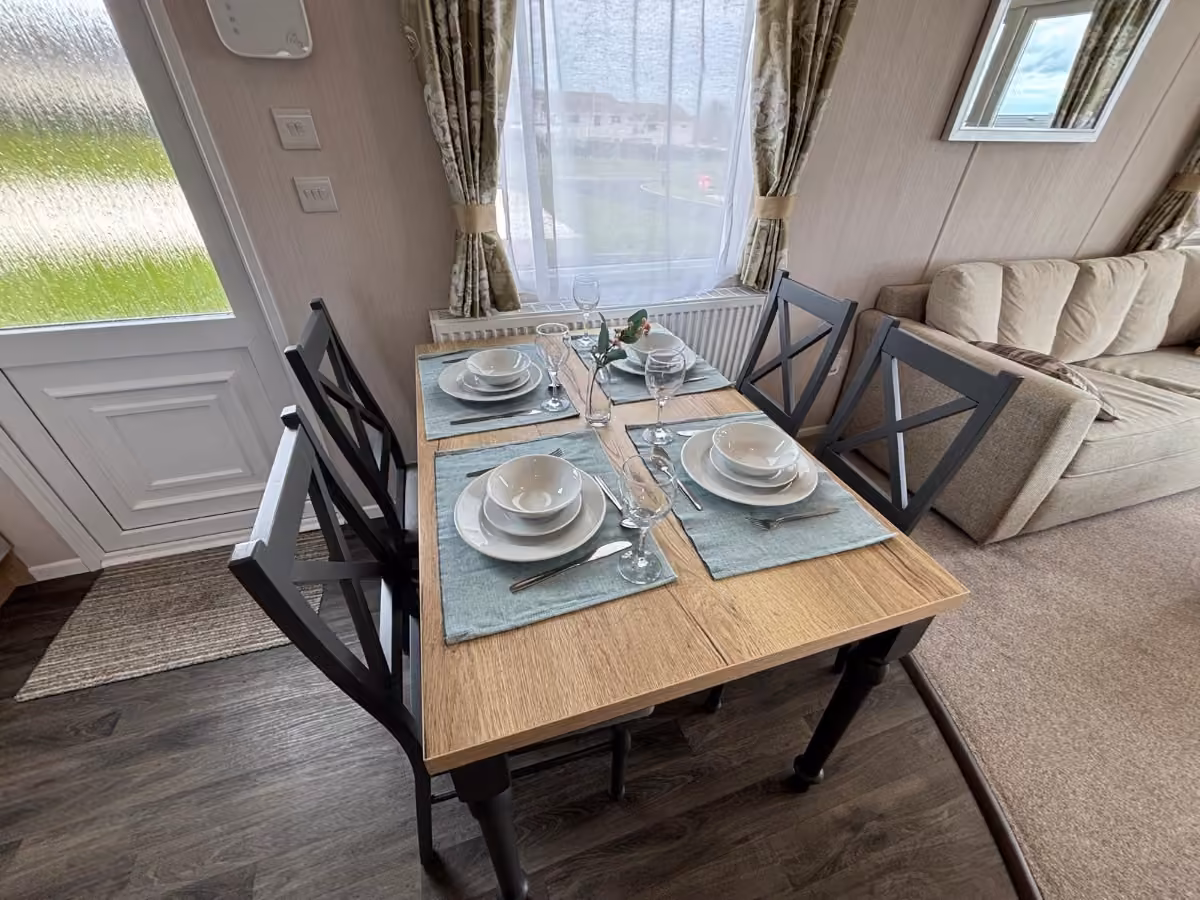 2021 Swift Bordeaux Exclusive 3 Bed Dining Area 1