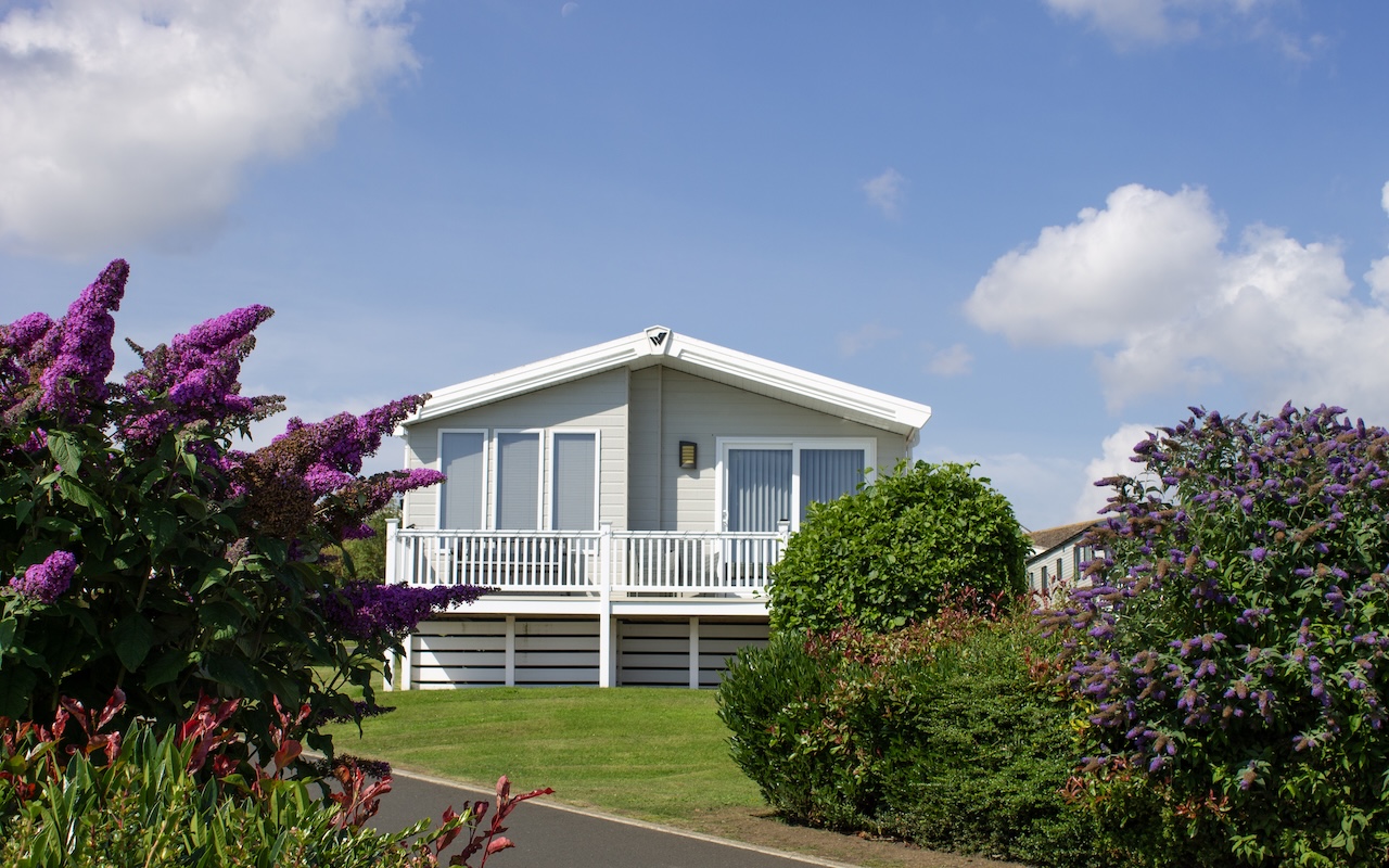 View of Holiday Home between Flowers