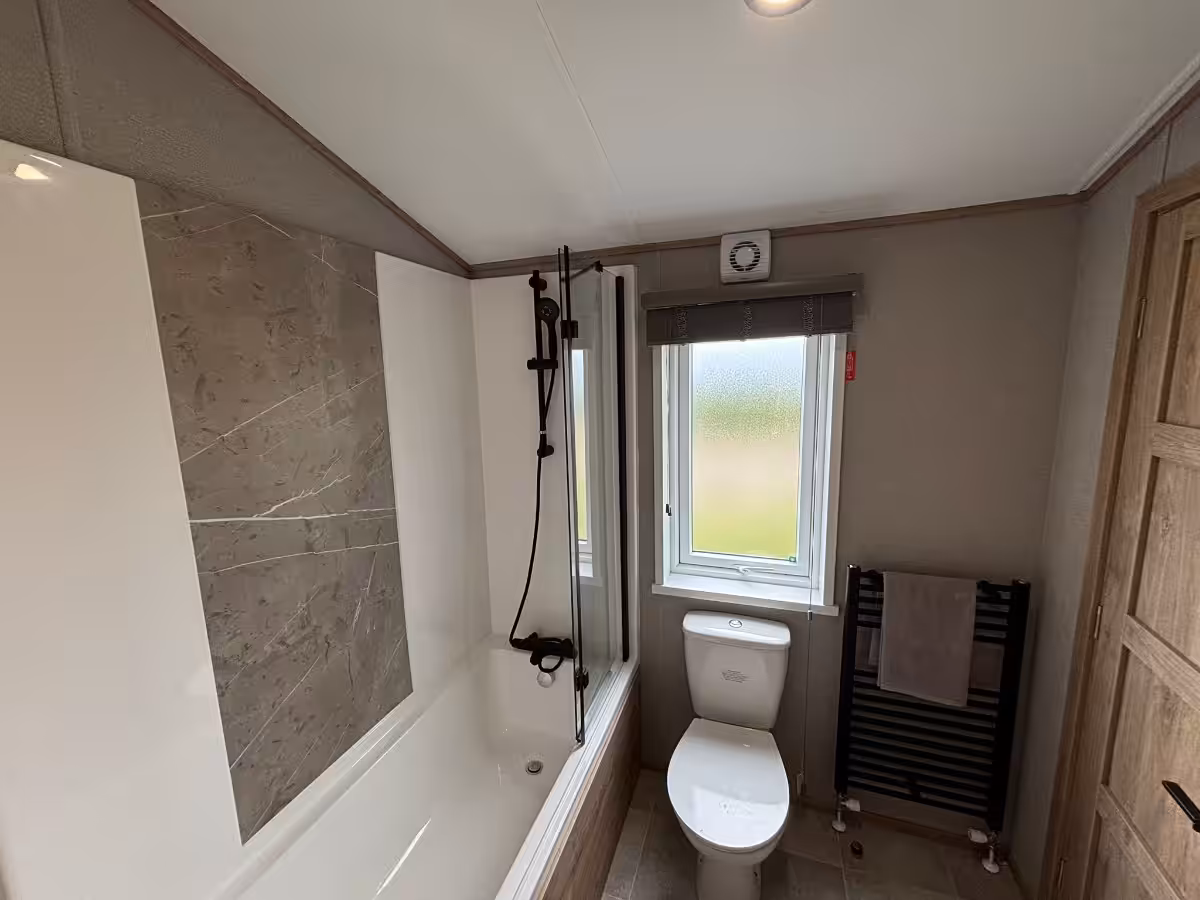 2026 ABI Kielder Lodge for sale at Elm Bank Coastal Park in Berwick, Northumberland - en suite bathroom and toilet