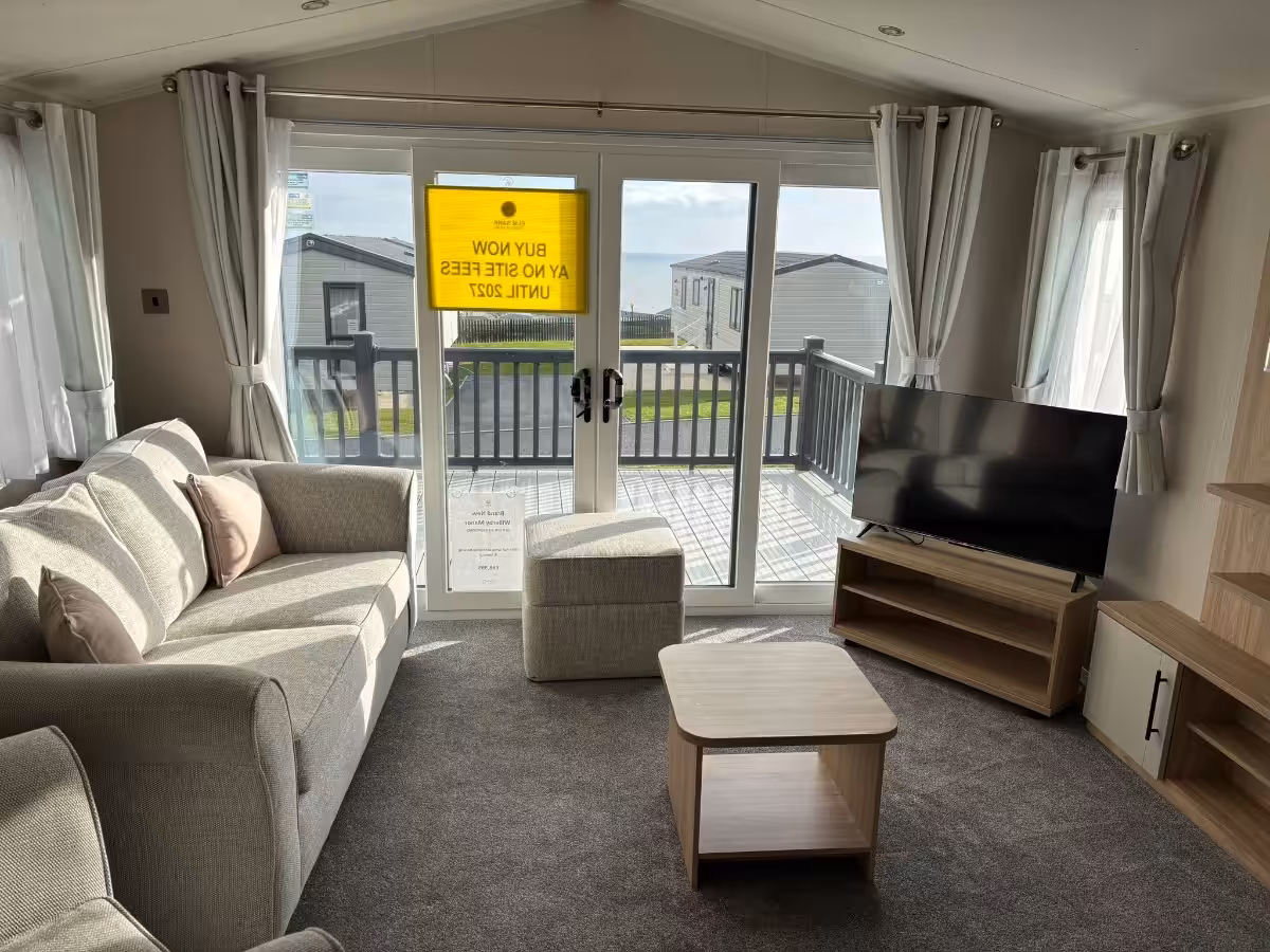Living room area in the 2023 Atlas Status on sale at Elm Bank Coastal Park in Berwick-upon-Tweed, Northumberland.