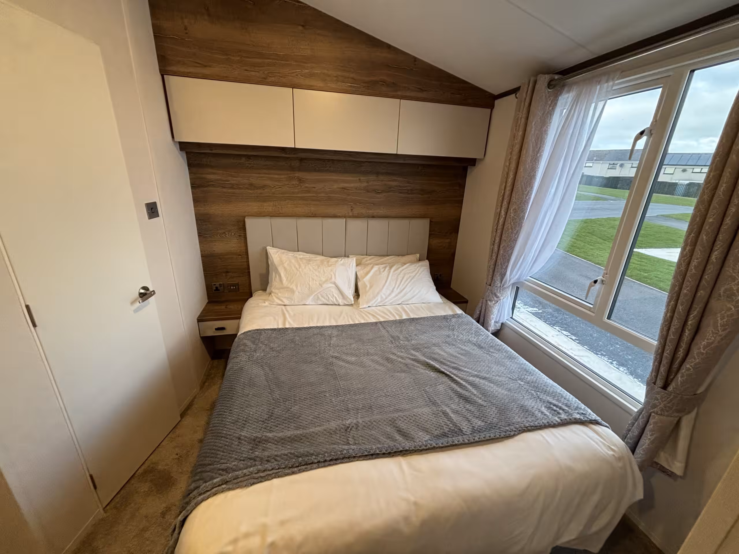 MAster bedroom in the 2023 Atlas Status on sale at Elm Bank Coastal Park in Berwick-upon-Tweed, Northumberland.