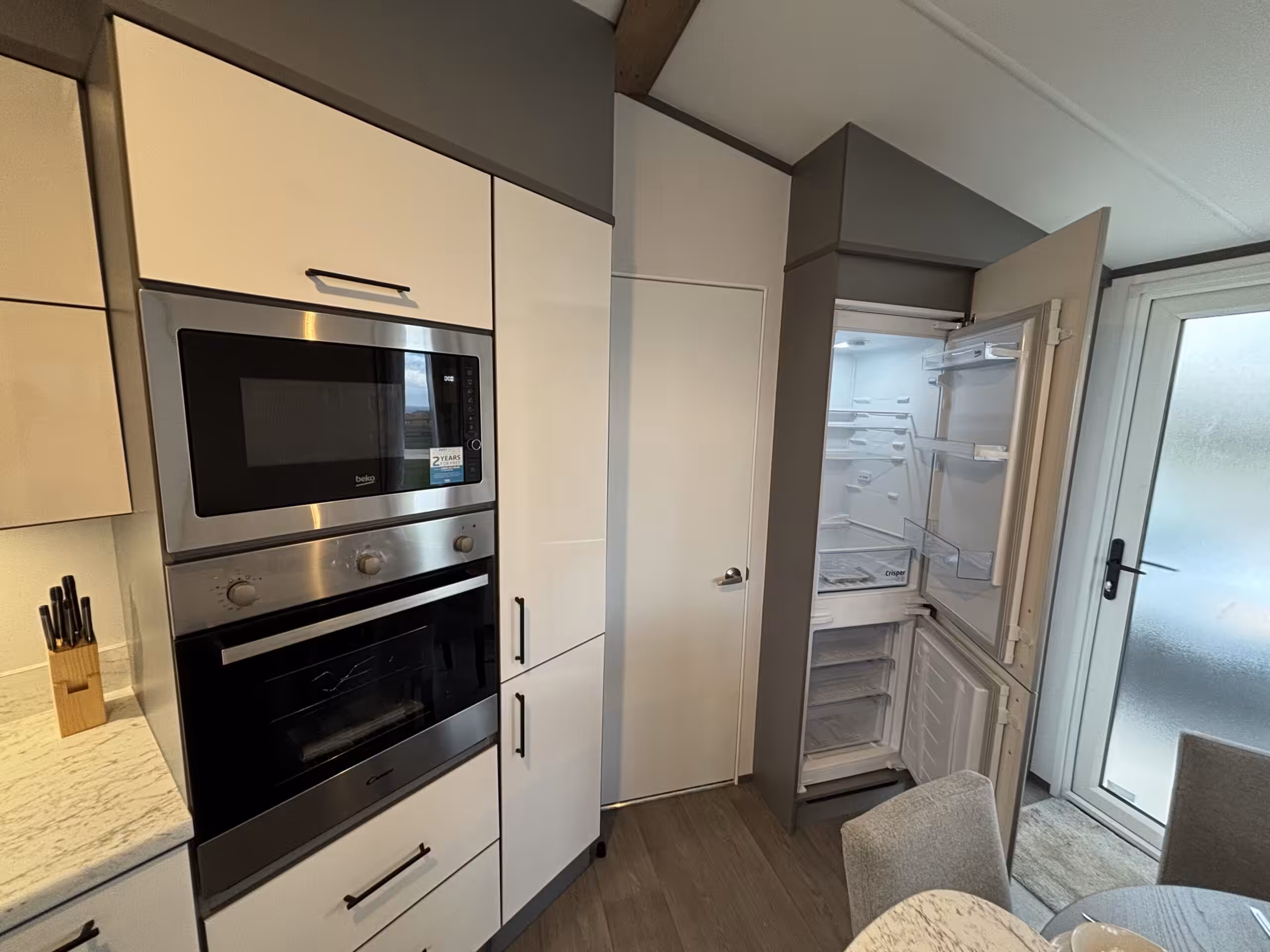 Cooker and fridge/freezer in the 2023 Atlas Status on sale at Elm Bank Coastal Park in Berwick-upon-Tweed, Northumberland.