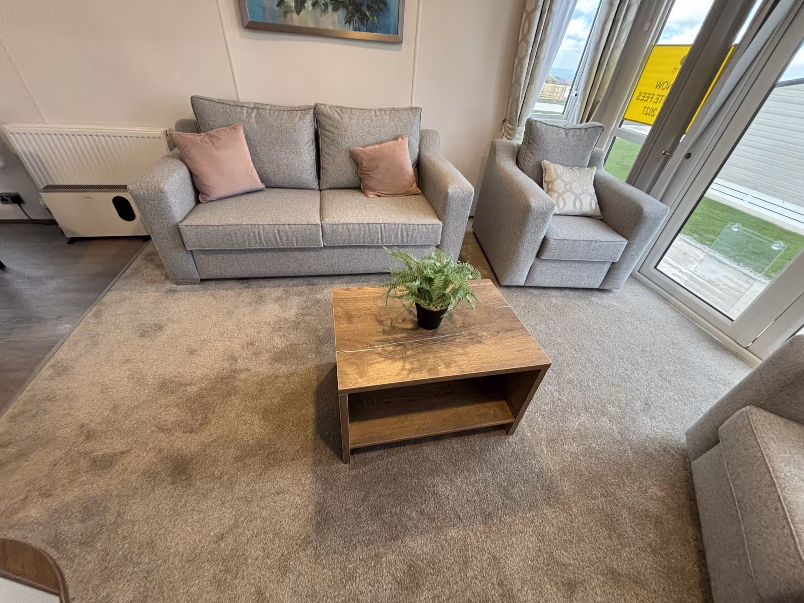 Living room area in the 2023 Atlas Status on sale at Elm Bank Coastal Park in Berwick-upon-Tweed, Northumberland.