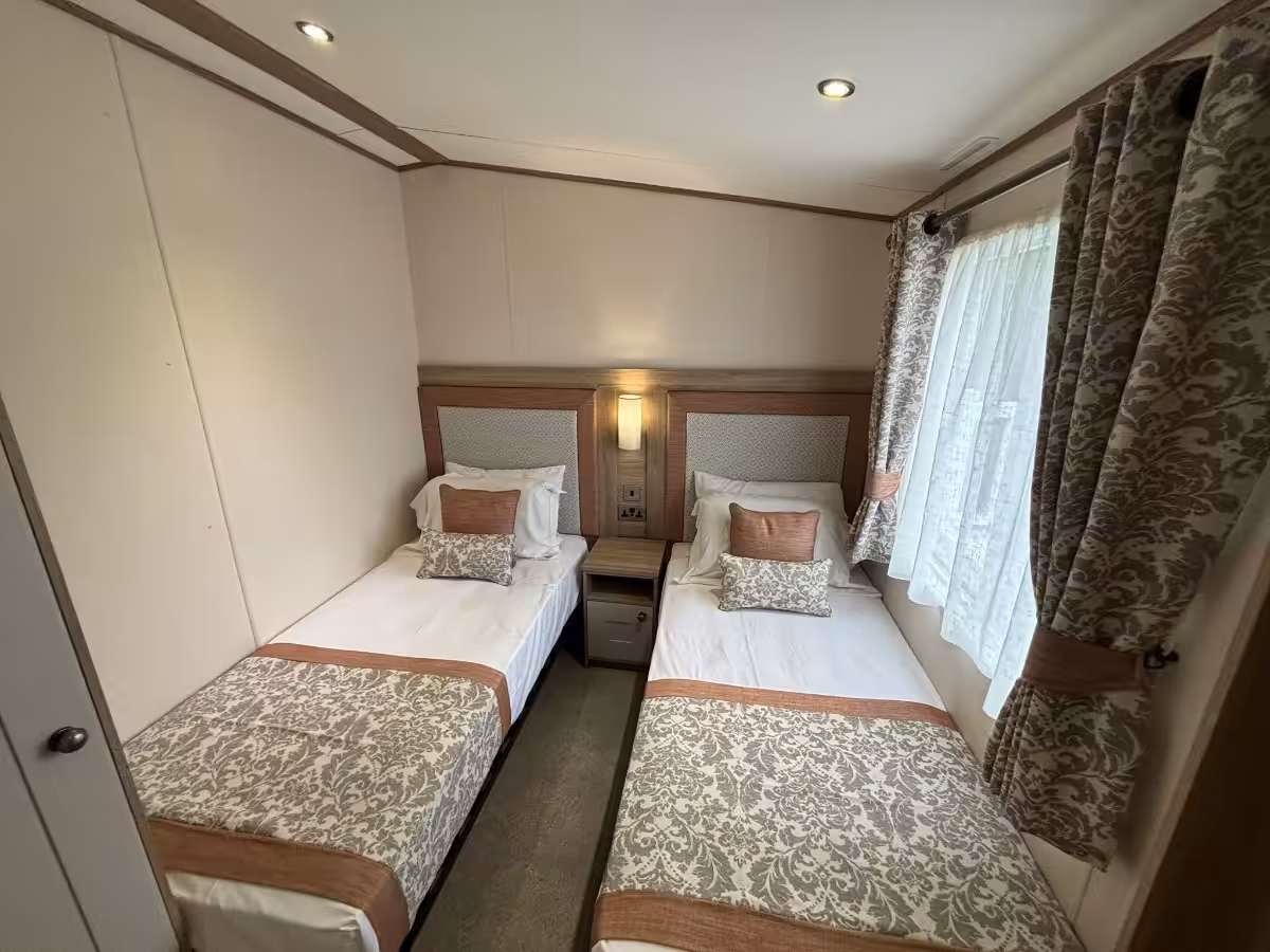 Twin bedroom in the 2021 ABI Adderstone Elite for sale at Elm Bank Coastal Park in Berwick, Northumberland.