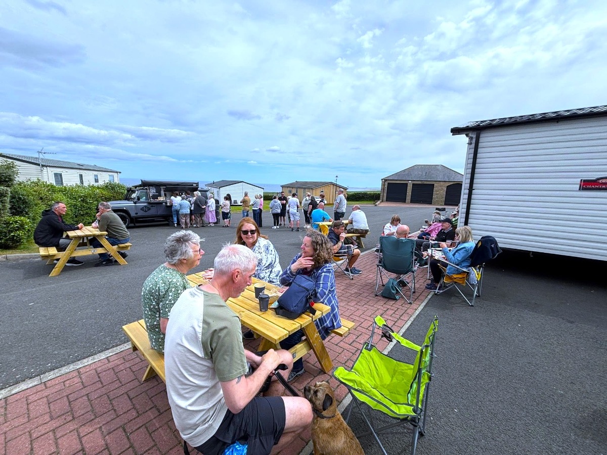 Owners at Elm Bank Coastal Park in Berwick, Northumberland enjoying the sunshine and delicious coffee and cake at our annual owners coffee afternoon.