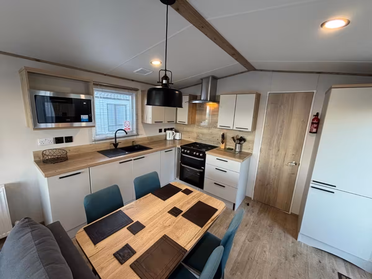 Kitchen dining area in the 2022 ABI Beverley for sale at Elm Bank Coastal Park in Spittal, Berwick-upon-Tweed, Northumberland.