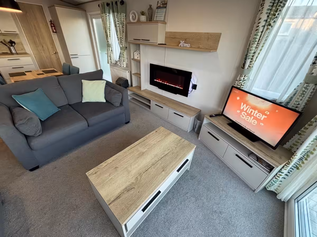 Free standing furniture in the living area of the 2022 ABI Beverley for sale at Elm Bank Coastal Park in Spittal, Berwick-upon-Tweed, Northumberland.