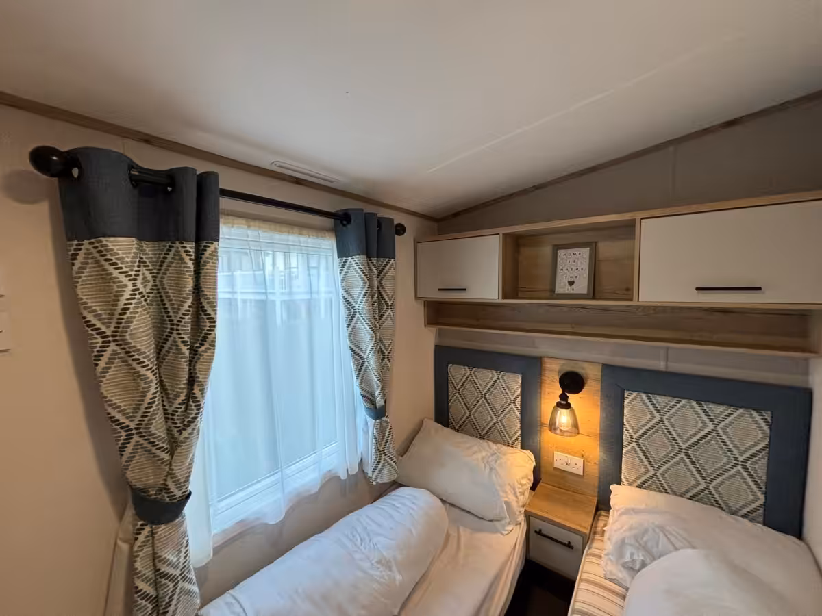 Twin bedroom in the 2022 ABI Beverley for sale at Elm Bank Coastal Park in Spittal, Berwick-upon-Tweed, Northumberland.