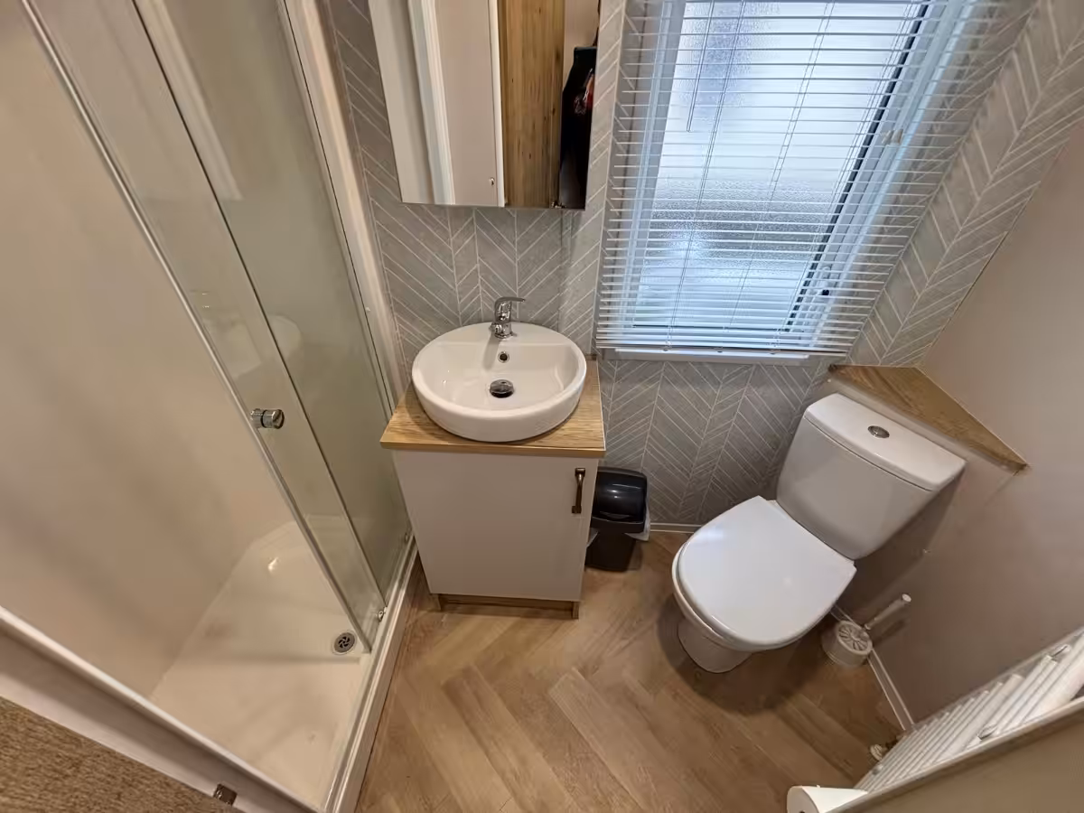 Family shower room in the 2022 Atlas Debonair for sale at Elm Bank Coastal Park in Spittal, Berwick-upon-Tweed, Northumberland.