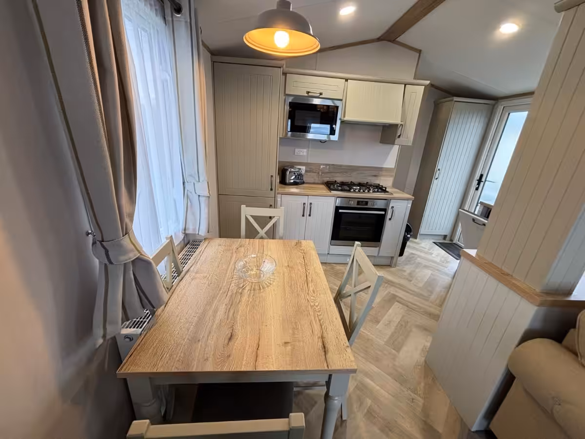 Kitchen dining area in the 2022 Atlas Debonair for sale at Elm Bank Coastal Park in Spittal, Berwick-upon-Tweed, Northumberland.
